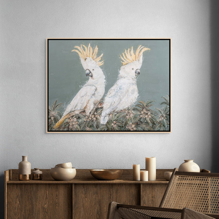 Stretched canvas presentation of Feathers and Mayhem by Stephanie Elizabeth with layered white cockatoos and textured brushwork.