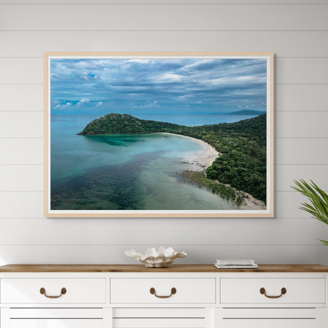 Four Seasons in One Day – Aerial view of Cape Tribulation with deep blue clouds, reef, and coastline | Framed Paper Print by David Lloyd