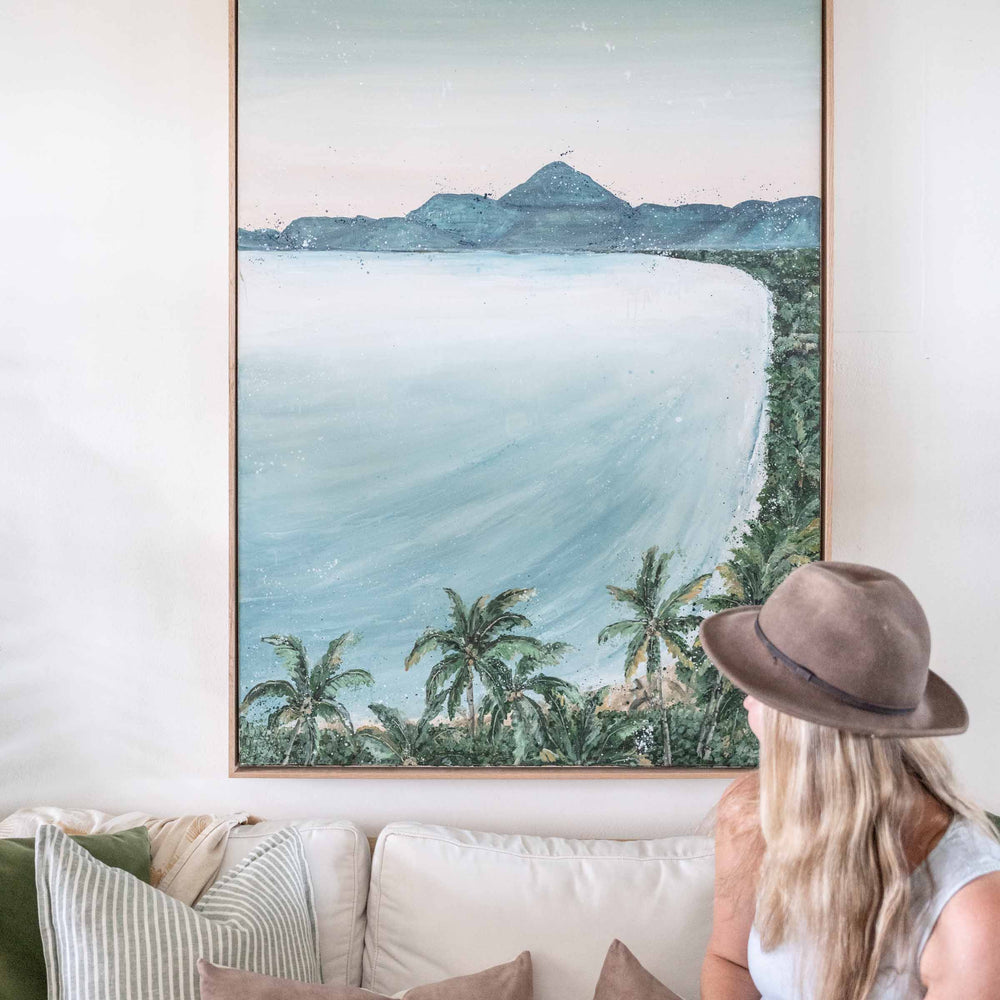 From the Lookout – close-up over-shoulder view of Stephanie Elizabeth with coastal artwork showing palm-lined shoreline and ocean detail | Original Artwork