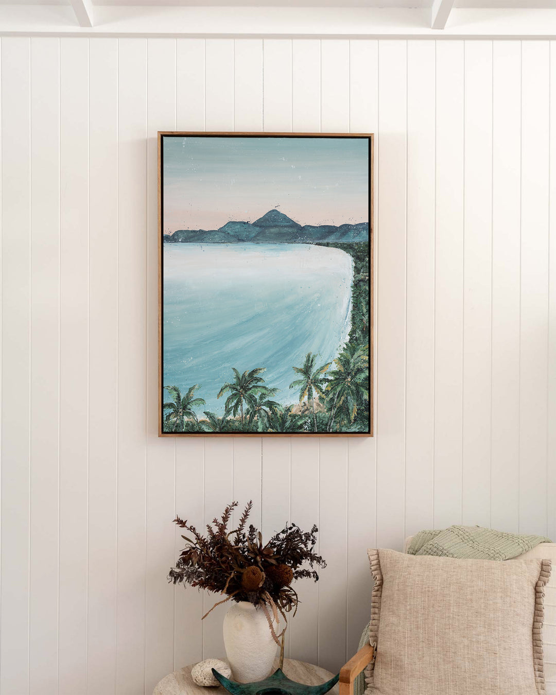 From the Lookout landscape fine art print by Stephanie Elizabeth, framed canvas in an oak frame in a bedroom