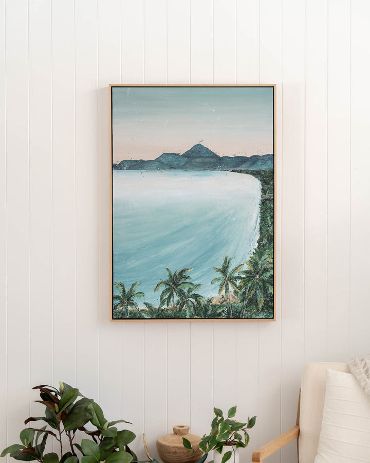 From the Lookout landscape fine art print by Stephanie Elizabeth, framed canvas in an oak frame in a hallway
