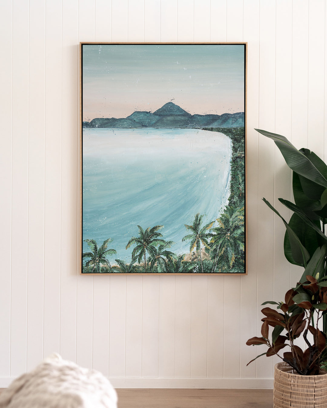From the Lookout – Port Douglas coastline landscape, framed canvas in oak float frame, styled in a living room