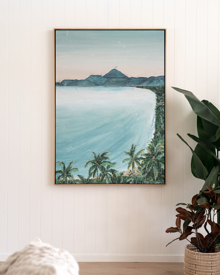 From the Lookout landscape fine art print by Stephanie Elizabeth, framed canvas in an oak frame in a living room