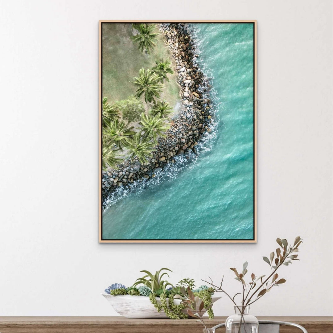 From the Ocean to the Treetops – Aerial photograph of Rex Smeal Park in Port Douglas with golden hour light over ocean, trees and rocks | Shadow Box Canvas Print