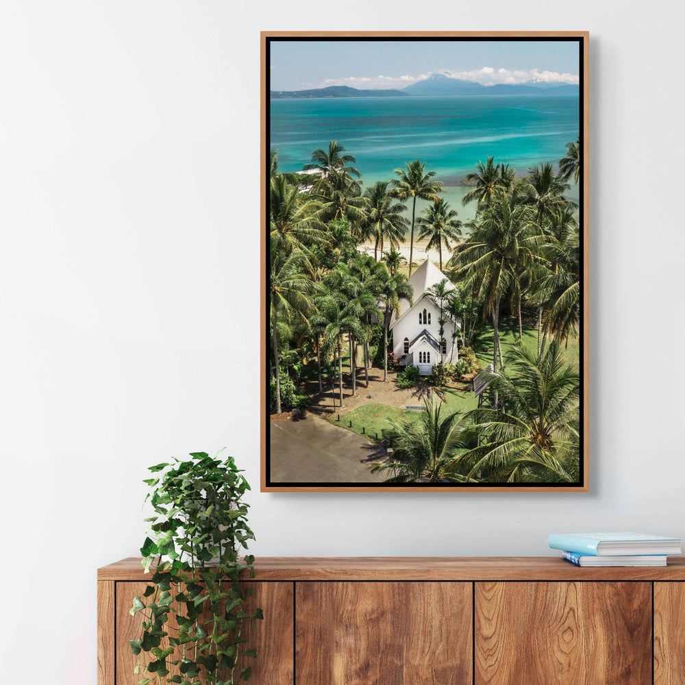 Give Me a Reason to Stay Here – Aerial view of St Mary’s, Port Douglas, with palm trees and a stunning green and blue seascape | Shadow Box Canvas Print