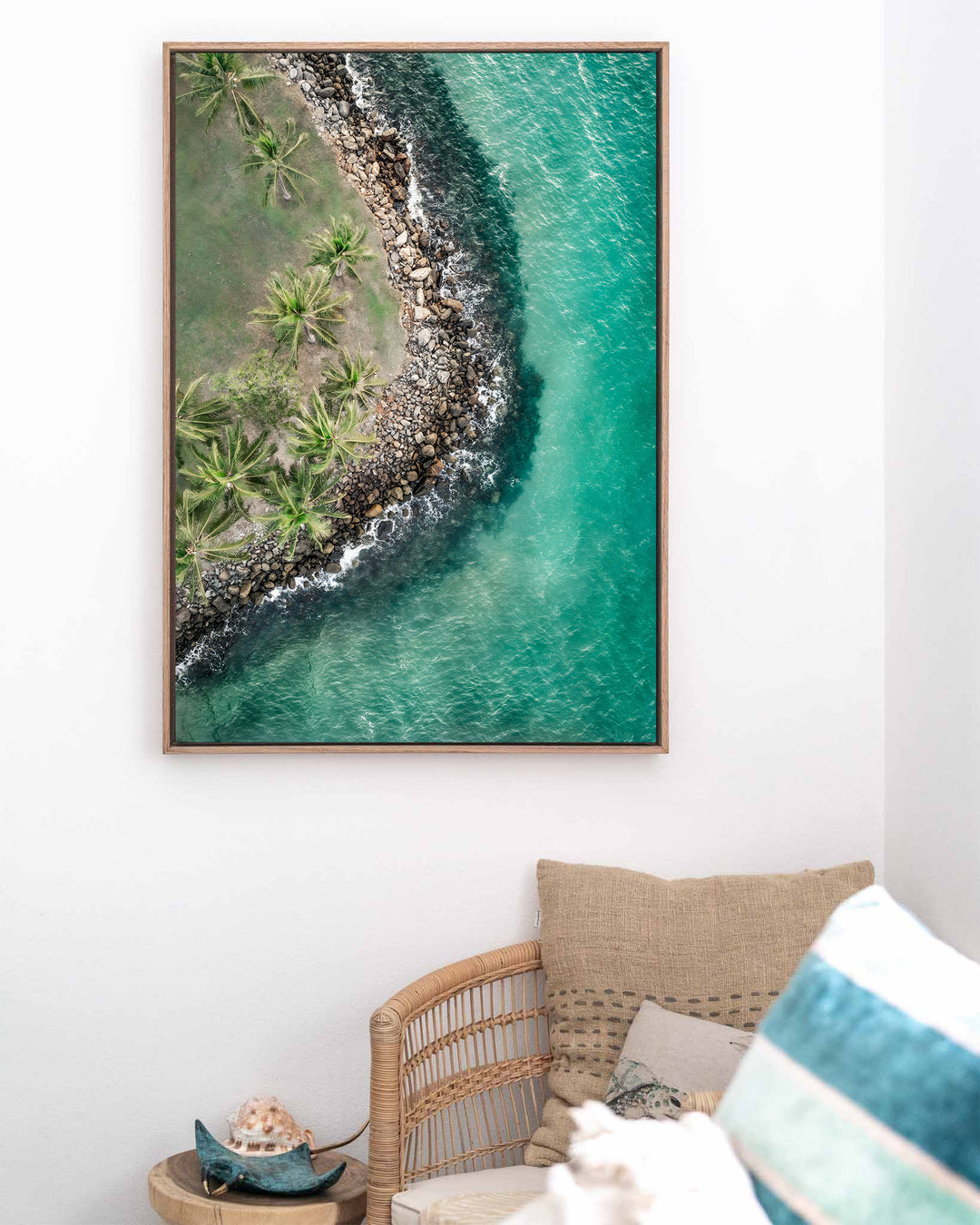 Hammocks and Hangouts – Rex Smeal, Port Douglas, Aerial Photography by David Lloyd, framed canvas print in oak float frame, styled in a coastal lounge setting