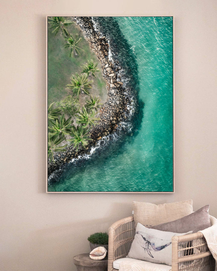 Hammocks and Hangouts – Rex Smeal, Port Douglas, Aerial Photography by David Lloyd, framed canvas print in oak float frame, styled in a sitting room setting