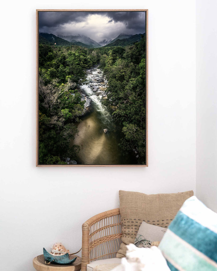 Hazy Habits – Mossman Gorge, Aerial Photography by David Lloyd, framed canvas print in oak float frame, styled in a coastal lounge setting