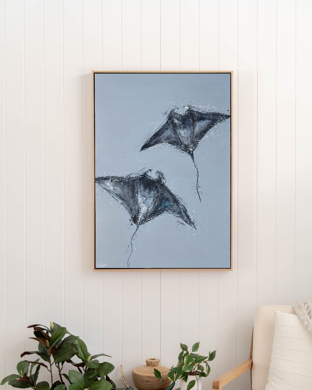 Heart Beats Slow manta rays fine art print by Stephanie Elizabeth, framed canvas in an oak frame in a hallway
