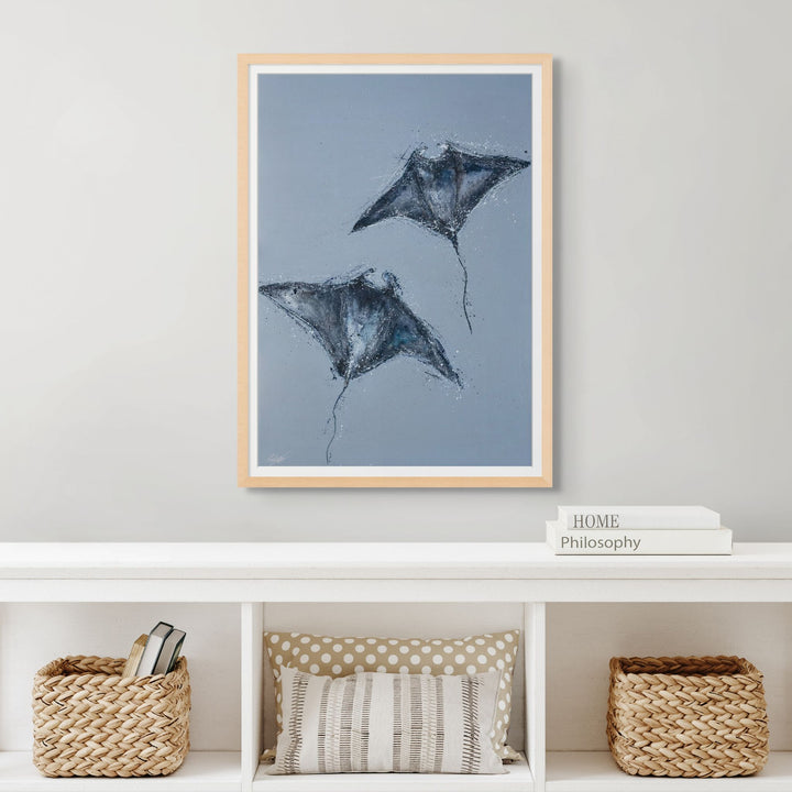 Heart Beats Slow – two rays gliding through soft blue water in a calm contemporary ocean artwork by Stephanie Elizabeth | Framed Paper Print