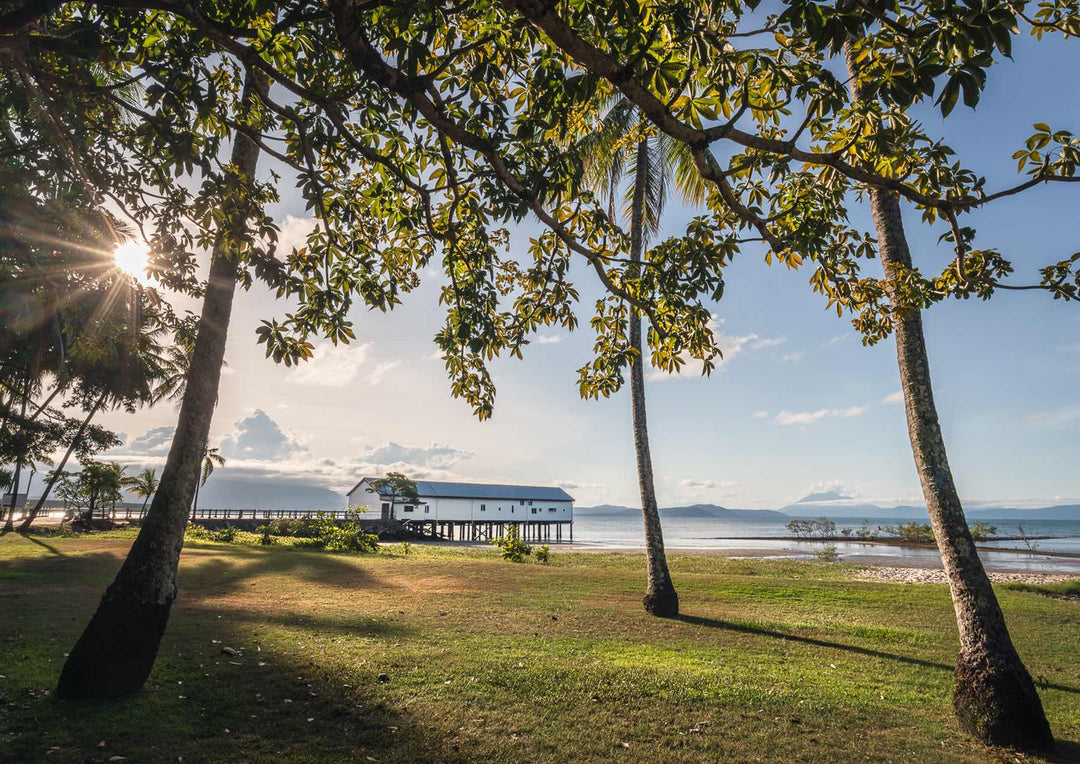 It’s Five O’Clock Somewhere – Sunset over Sugar Wharf, Port Douglas with clouds masking the Daintree Ranges | Unframed Rolled Print by David Lloyd