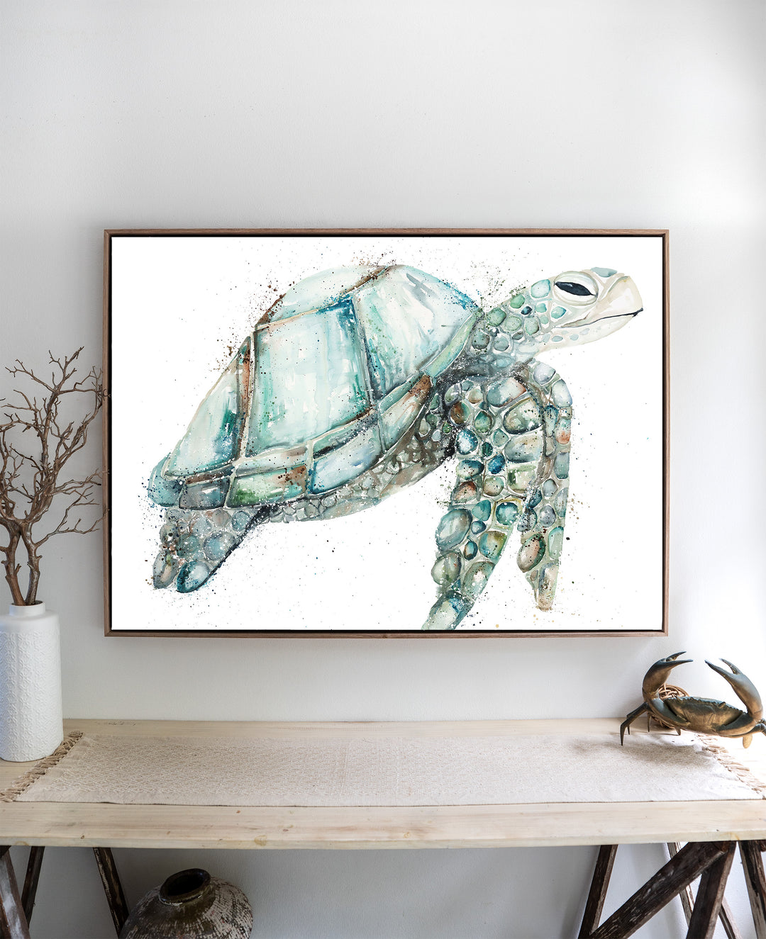 Jade – sea turtle, framed canvas in oak float frame, styled above a side table