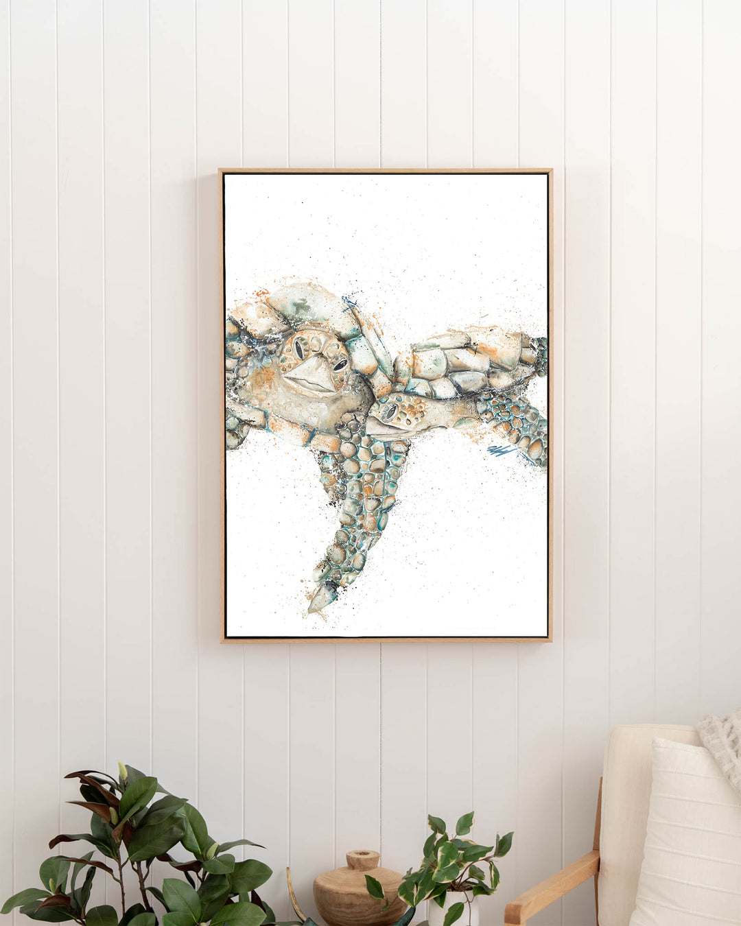 Joined at the Hip – sea turtles, framed canvas in oak float frame, styled in a hallway