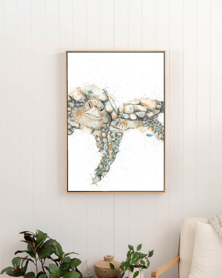 Joined at the Hip – sea turtles, framed canvas in oak float frame, styled in a hallway