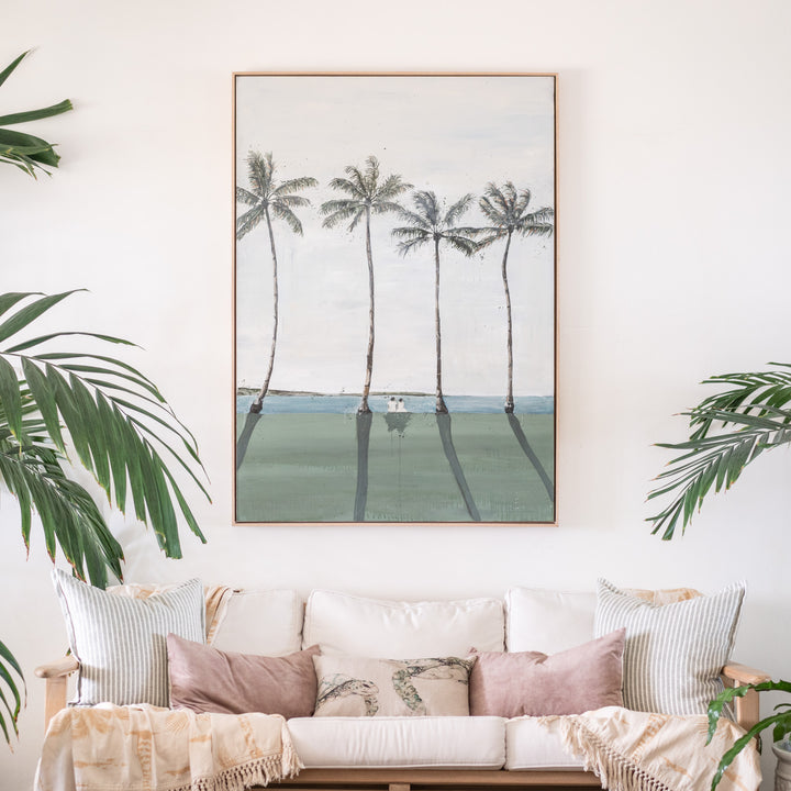 Just Us – original coastal artwork by Stephanie Elizabeth displayed in Australian oak frame above a sofa in a light tropical interior