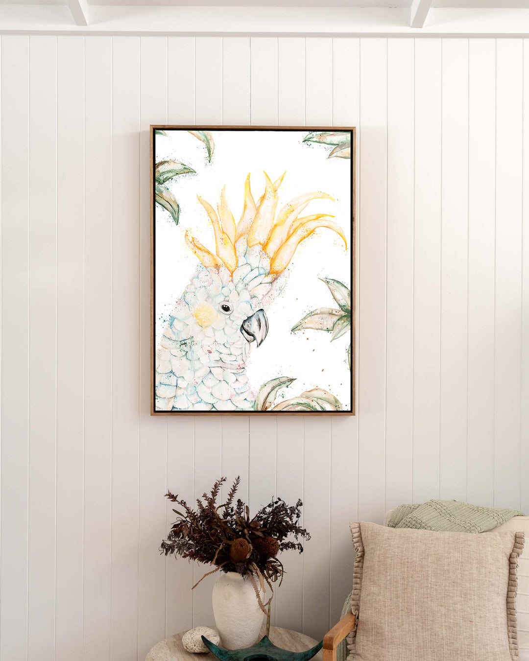 Lemon Sorbet – white cockatoo, framed canvas in oak float frame, styled in a bedroom