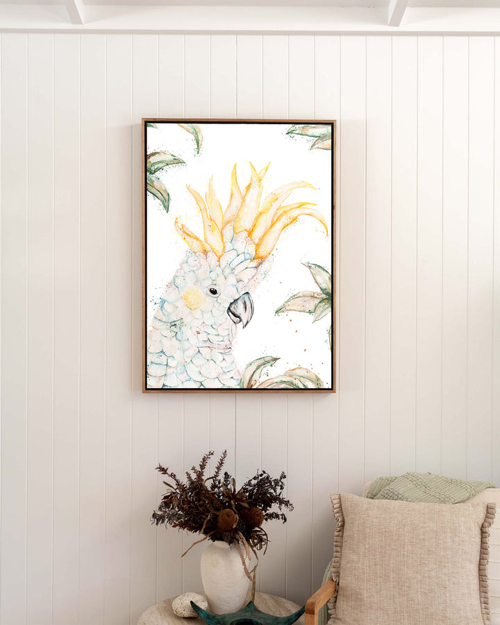 Lemon Sorbet – white cockatoo, framed canvas in oak float frame, styled in a bedroom