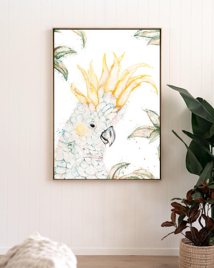 Lemon Sorbet – white cockatoo, framed canvas in oak float frame, styled in a living room
