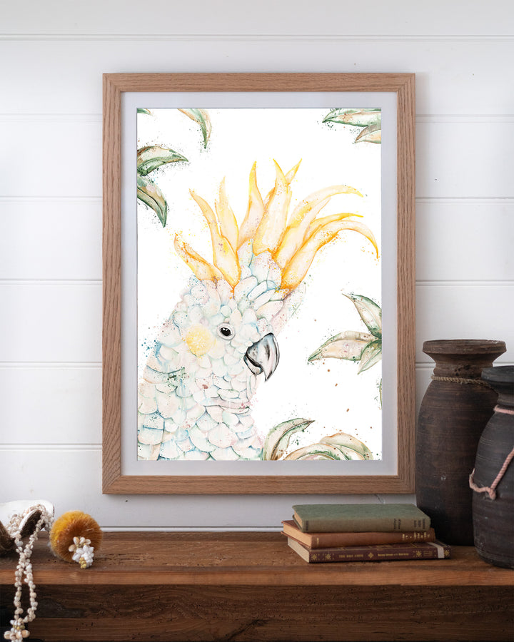 Lemon Sorbet – white cockatoo, framed paper print in oak frame, styled on a timber shelf