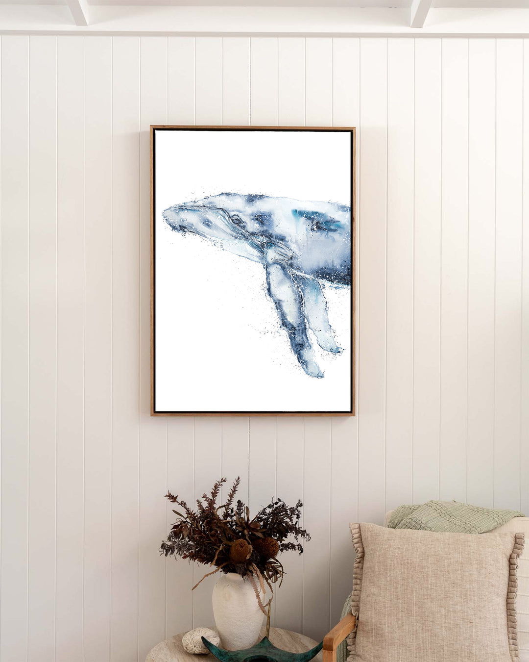 Locking Eyes – humpback whale, framed canvas in oak float frame, styled in a bedroom