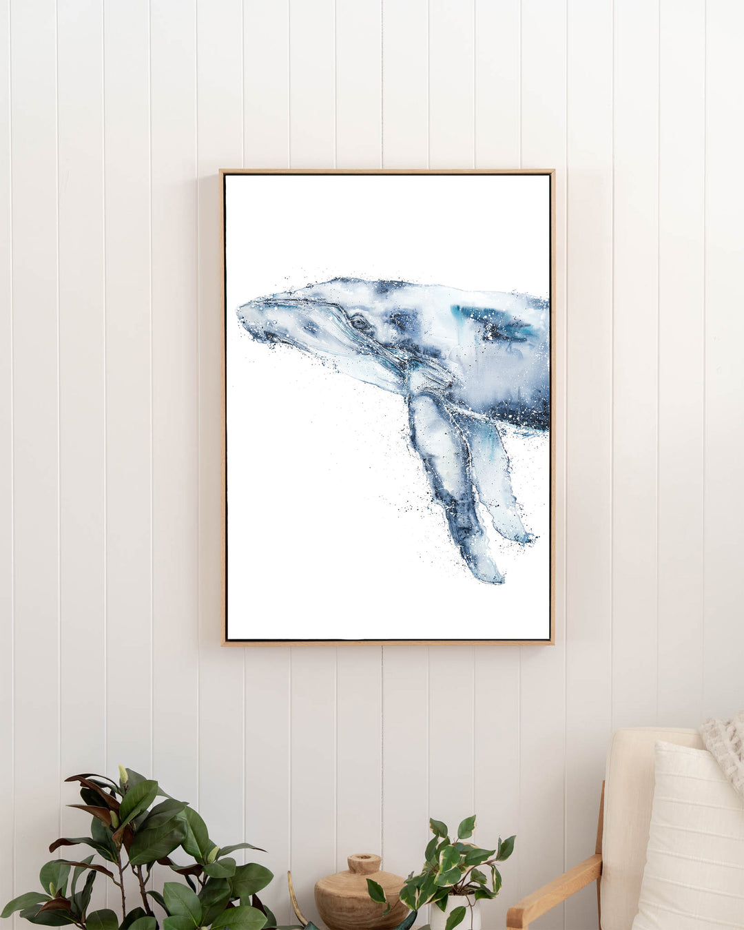 Locking Eyes – humpback whale, framed canvas in oak float frame, styled in a hallway