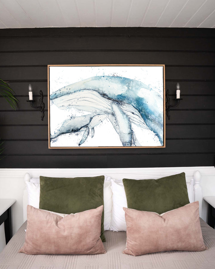 Long Days, Short Years – humpback whale mother and calf, framed canvas in oak float frame, styled in a bedroom