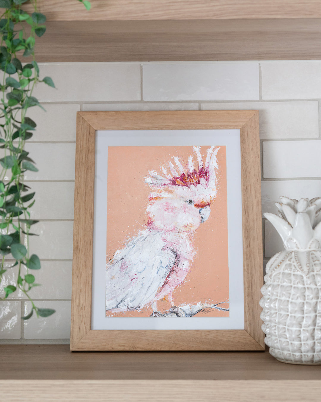Major Milestone – Major Mitchell cockatoo, framed paper print in oak frame, styled on a kitchen shelf
