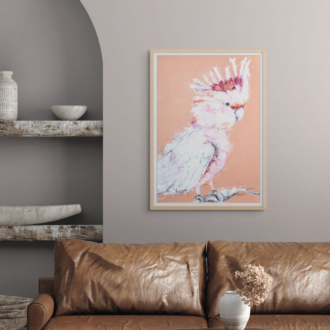 Major Milestone by Stephanie Elizabeth – framed paper print of elegant a Major Mitchel - Pink Galah with an orange background