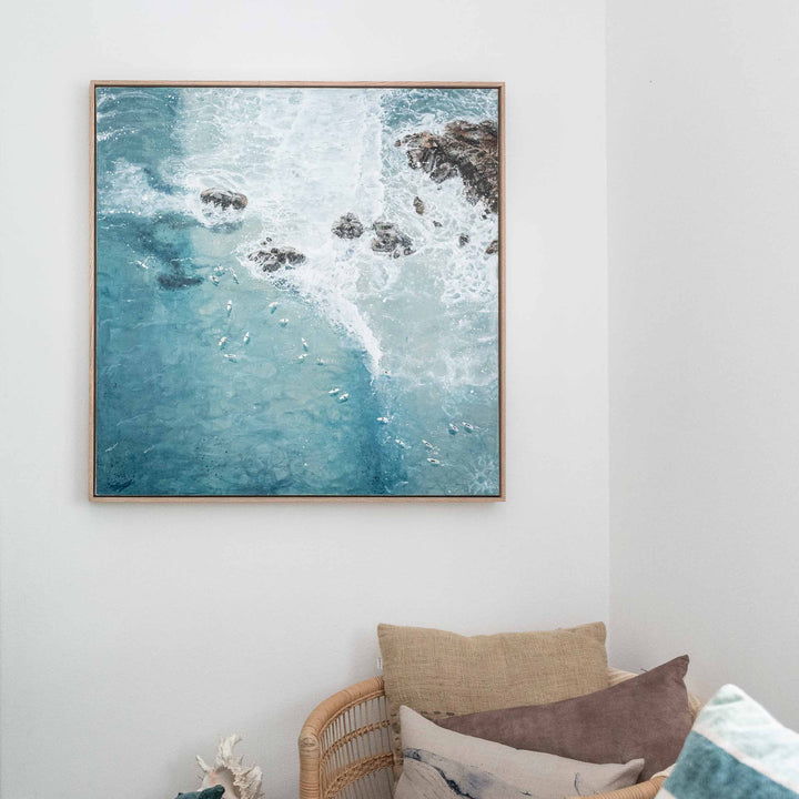 Meet Me at the Pass – Byron Bay surf artwork featuring waves breaking over rocks with surfers waiting in blue water styled in coastal interior | Original Artwork