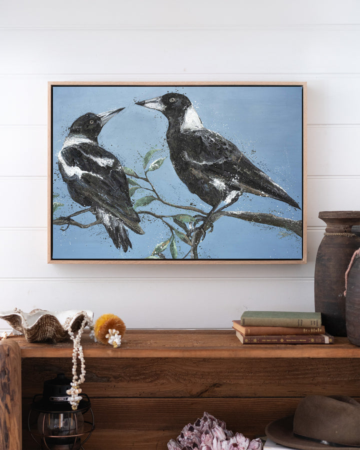 Monochrome Muses – magpies, framed canvas in oak float frame, styled above a timber console