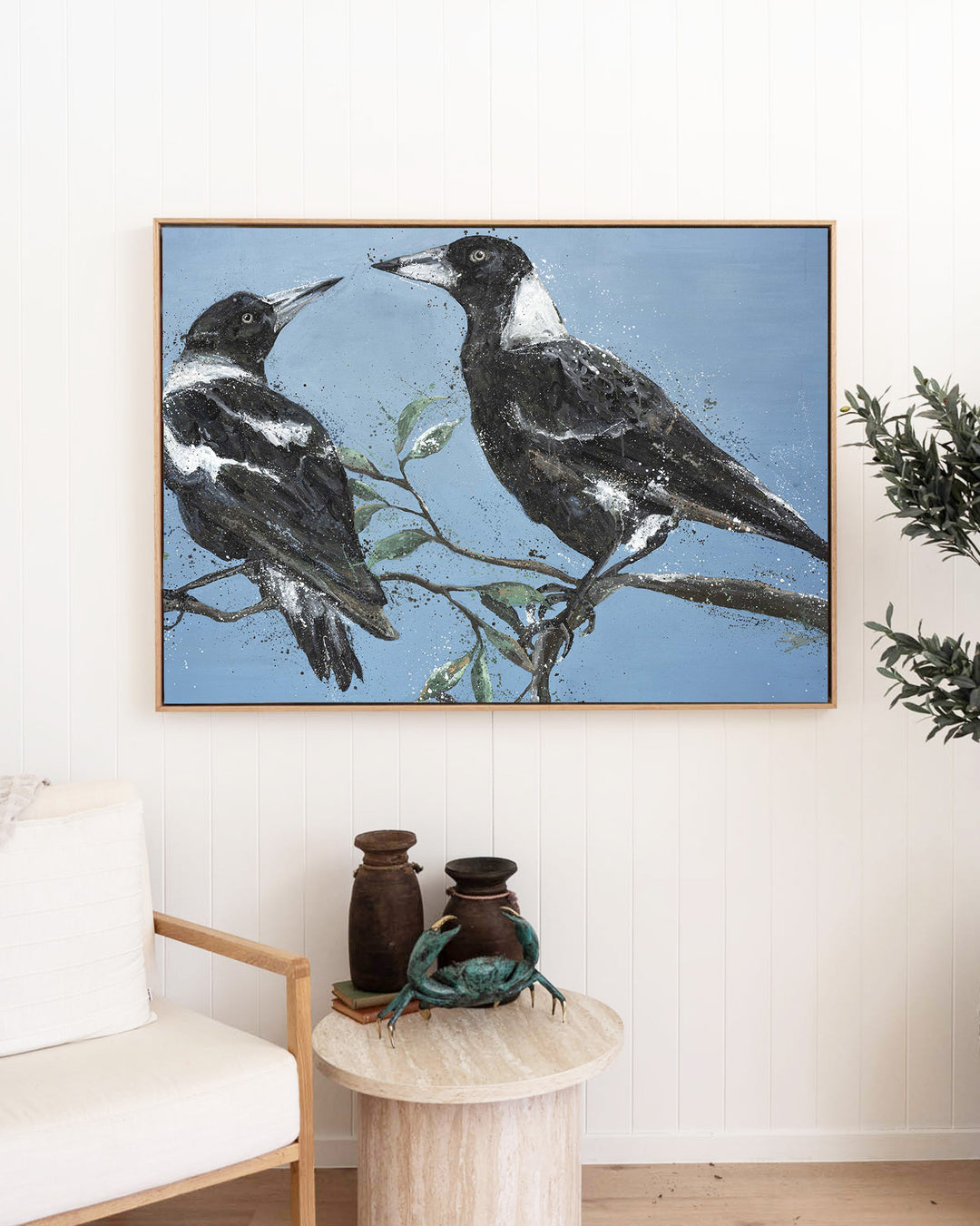 Monochrome Muses – magpies, framed canvas in oak float frame, styled in a living room