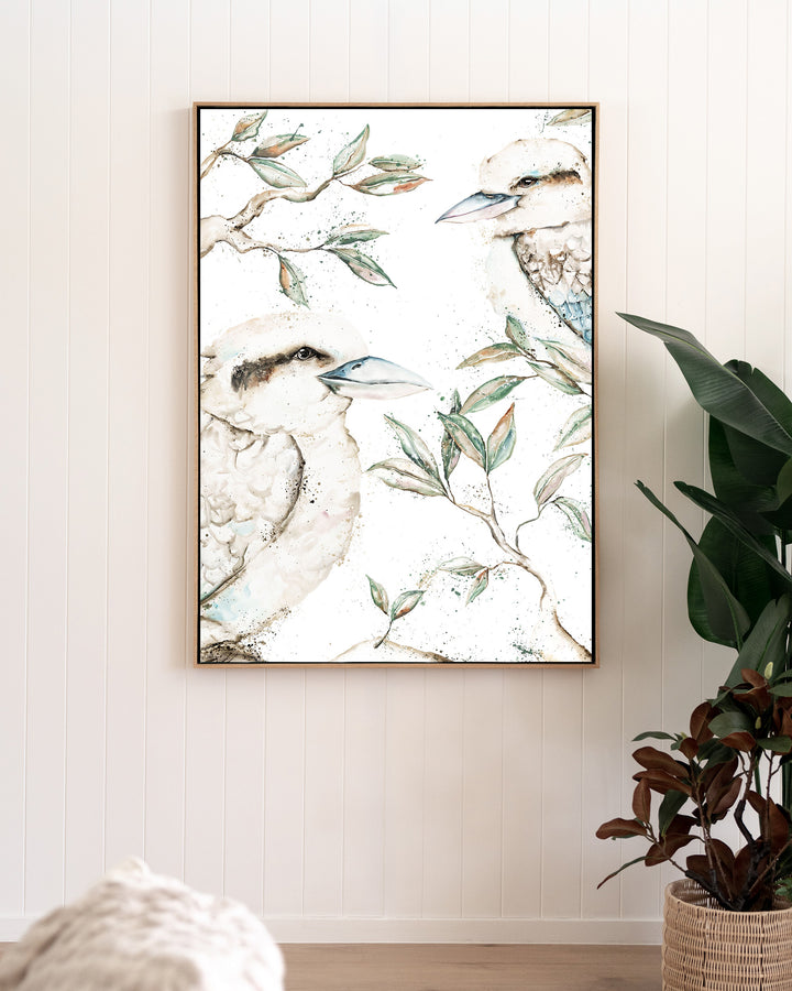 Morning Chatter – kookaburras, framed canvas in oak float frame, styled in a living room
