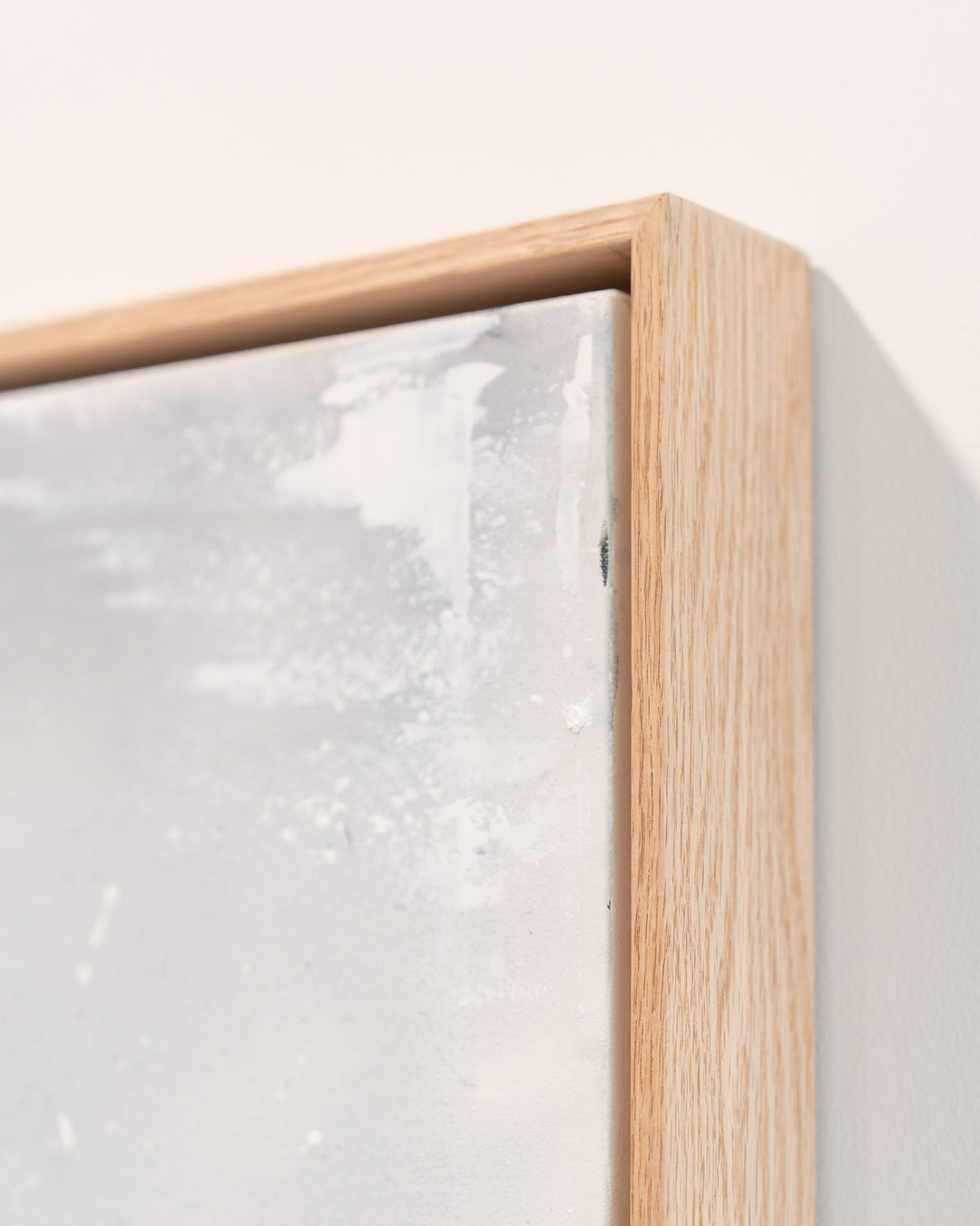 Morning Ritual framed canvas with abstract white and gray brushstrokes in a simple wooden frame.