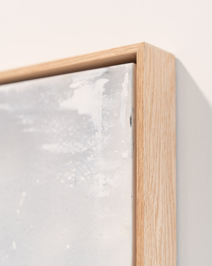 Morning Ritual framed canvas with abstract white and gray brushstrokes in a simple wooden frame.