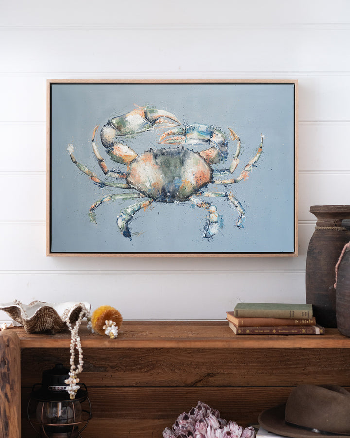 Muddy Days – mud crab, framed canvas in oak float frame, styled above a timber console