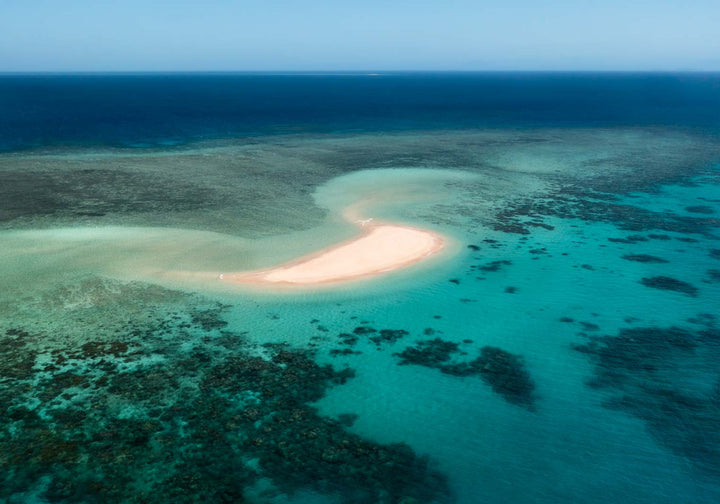 Nothing But Blue Skies – Aerial photograph of Mackay Cay with pristine sand, turquoise waters, and coral patterns | Unframed Rolled Print