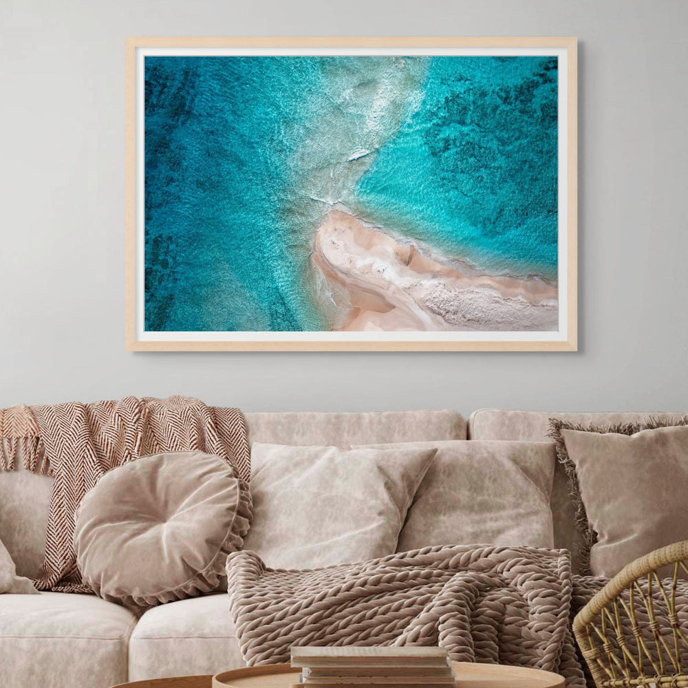 Nothing but Footprints – Aerial view of ocean with sandy beach and footprints in the sand | Framed Paper Print