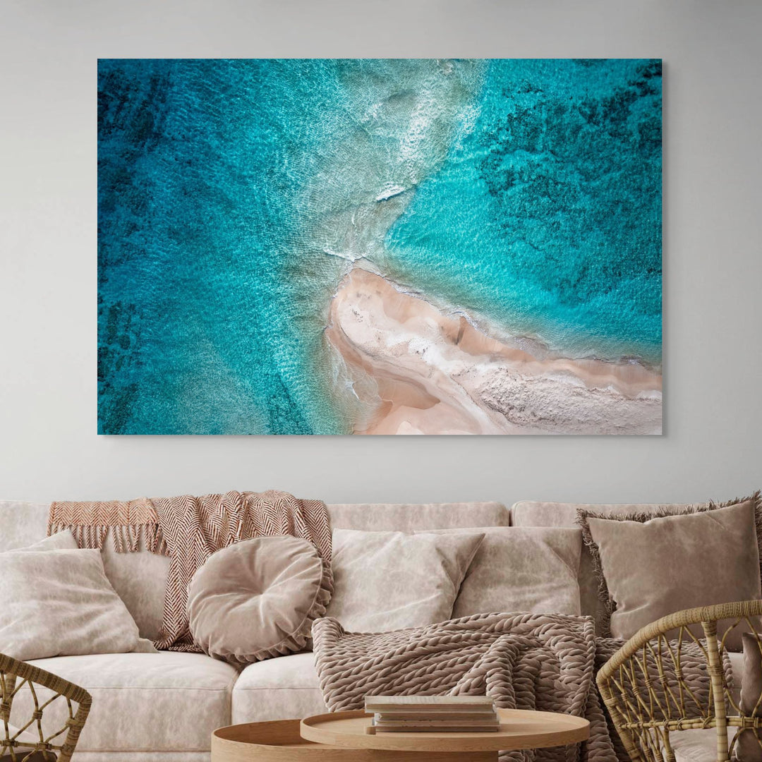 Nothing but Footprints – Aerial view of ocean with sandy beach and footprints in the sand | Stretched Canvas Print