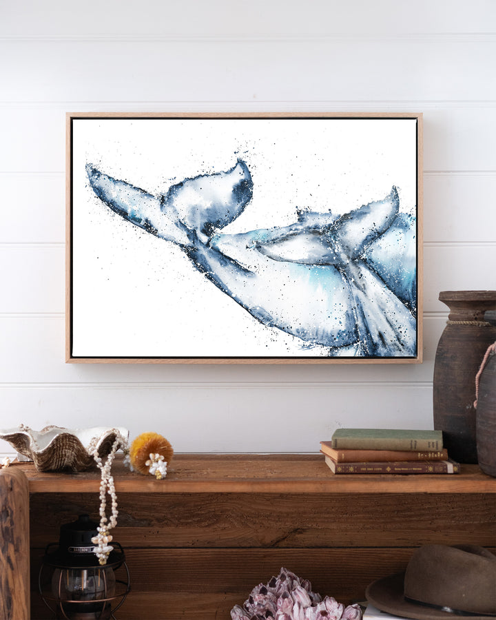 One Tale, Two Tails – whale tails, framed canvas in oak float frame, styled above a timber console