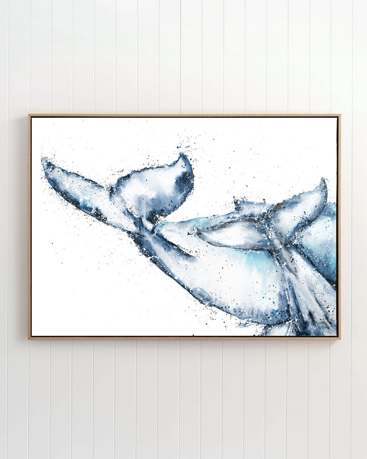 One Tale, Two Tails – whale tails, framed canvas in oak float frame