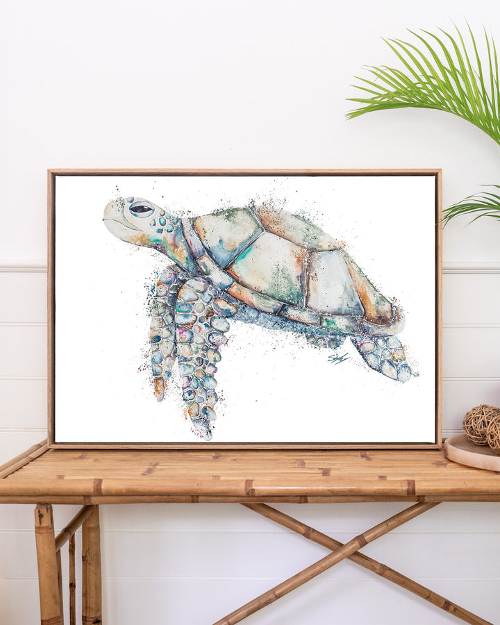 Patchwork – sea turtle, framed canvas in oak float frame, styled on a rattan table