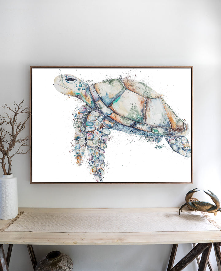 Patchwork – sea turtle, framed canvas in oak float frame, styled above a side table