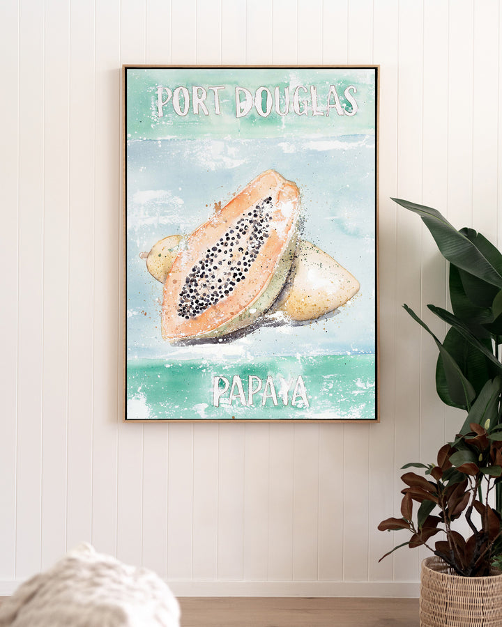 Port Douglas Papaya – tropical still life of papaya, framed canvas in oak float frame, styled in a living room