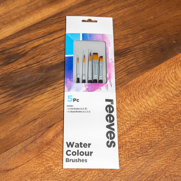 SEA Gallery 5 Piece Brush Set neatly arranged on a wooden tabletop.