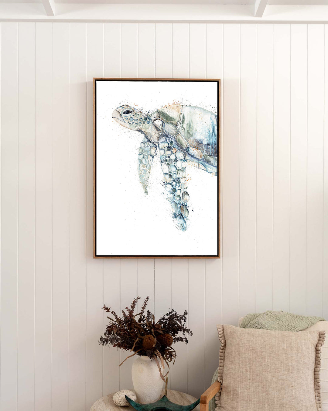 Renegade green sea turtle fine art print by Stephanie Elizabeth, framed canvas in an oak frame in a bedroom