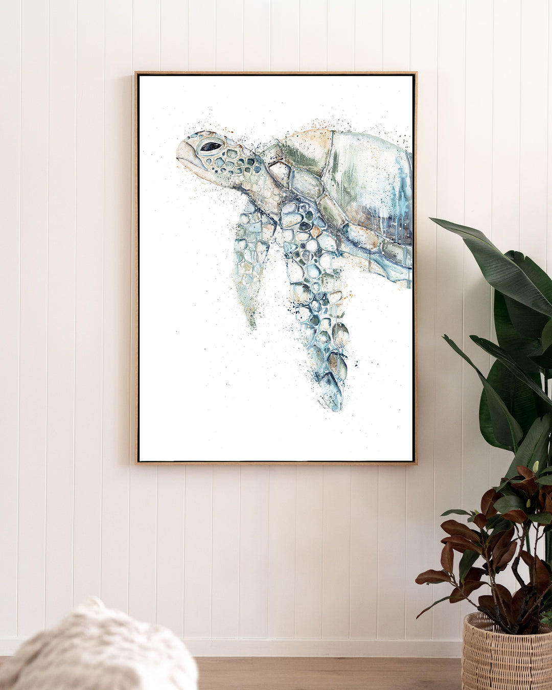 Renegade green sea turtle fine art print by Stephanie Elizabeth, framed canvas in an oak frame in a living room