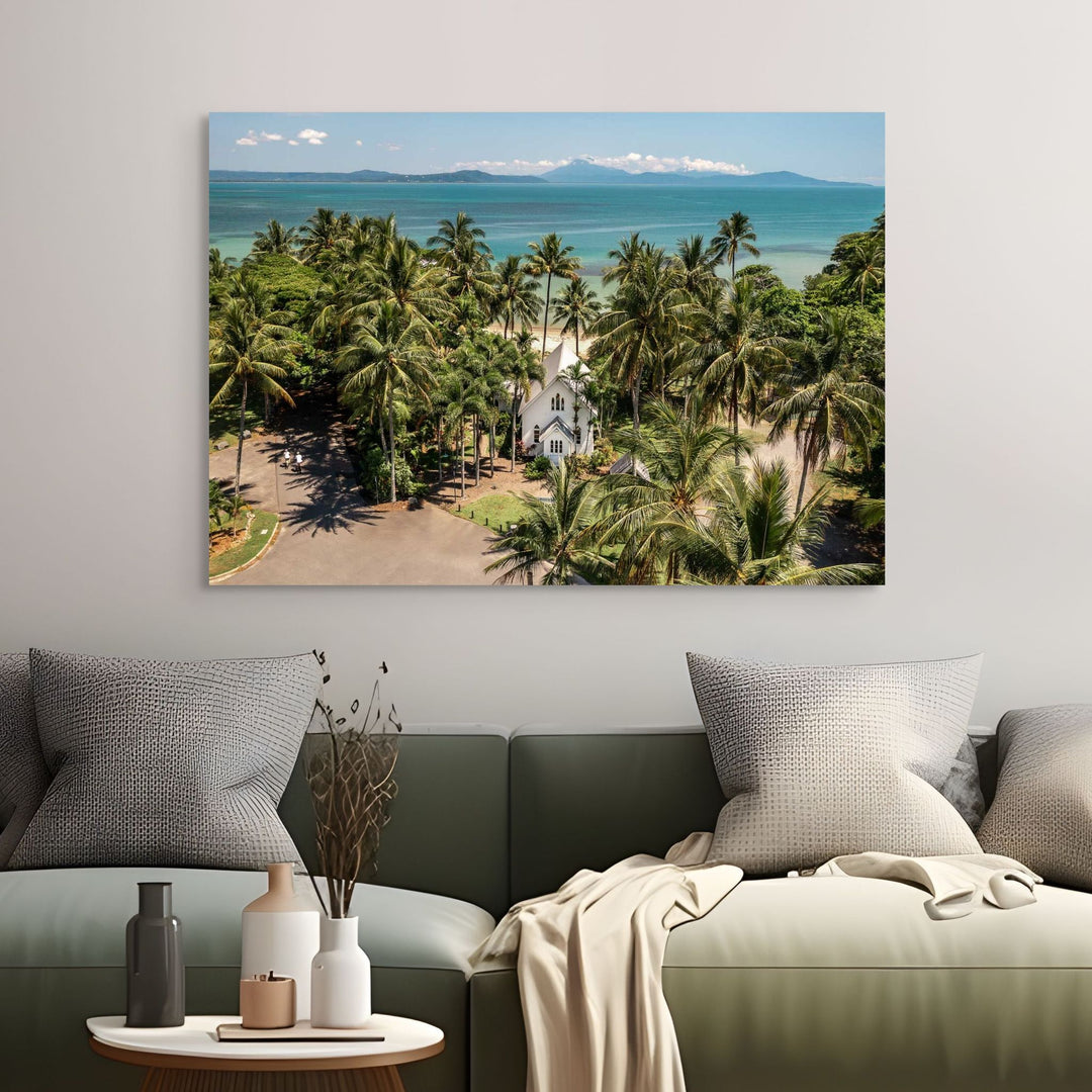 Rolling to the Seaside – Aerial view over St Mary’s, Port Douglas on a perfectly flat day with tropical waters, blue skies, and distant mountains | Stretched Canvas Print