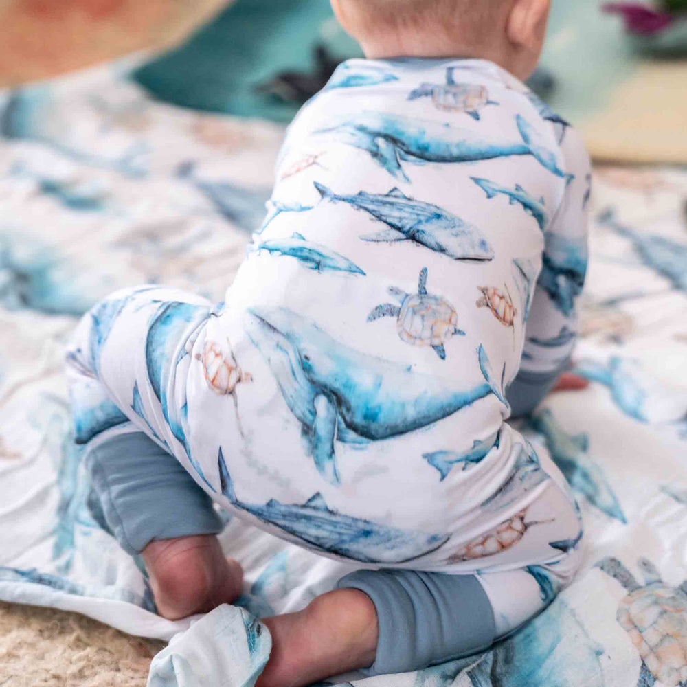 Sea Life Baby Onesie – humpback whale, turtles, sharks - back crawling view