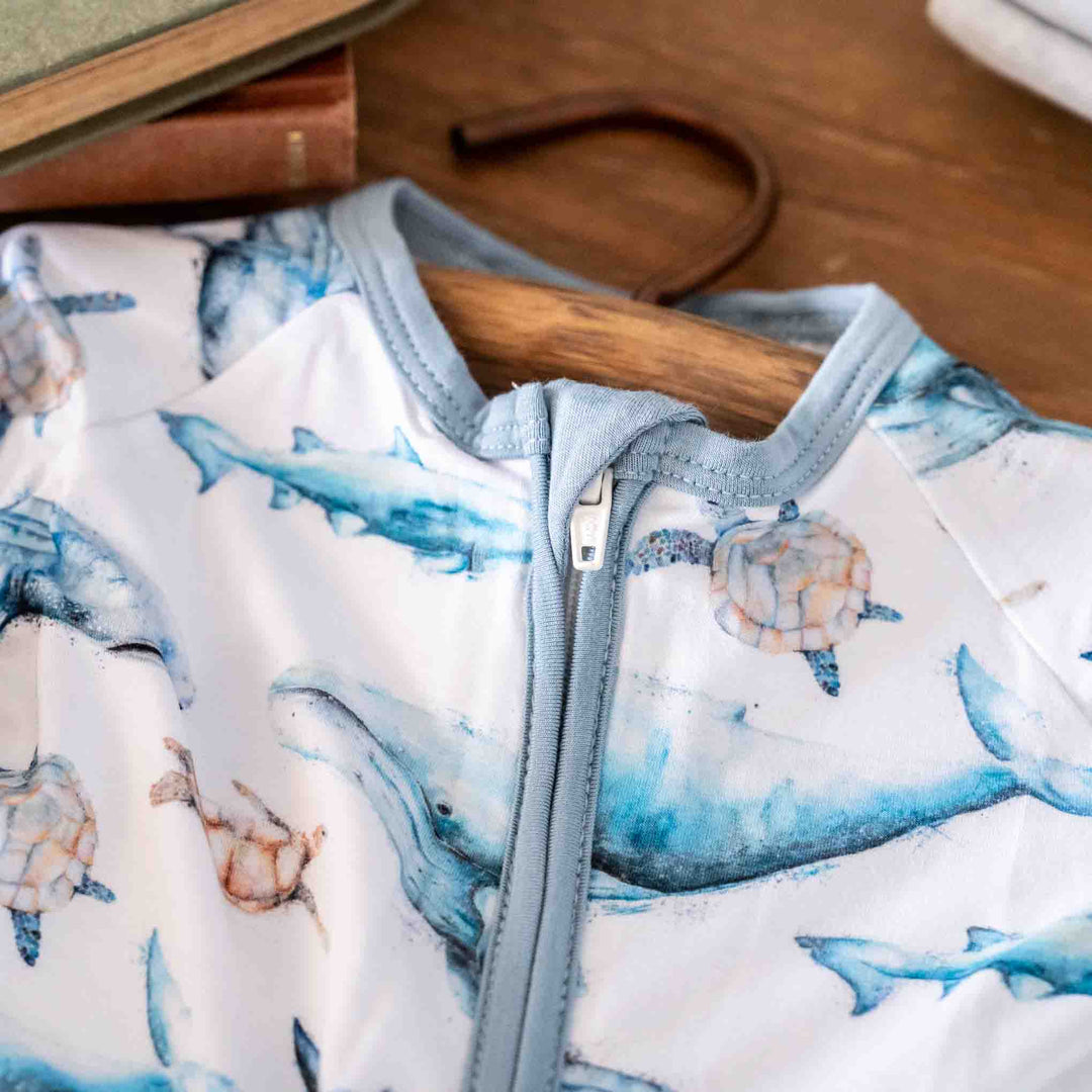 Sea Life Baby Onesie – humpback whale, turtles, sharks - close up view