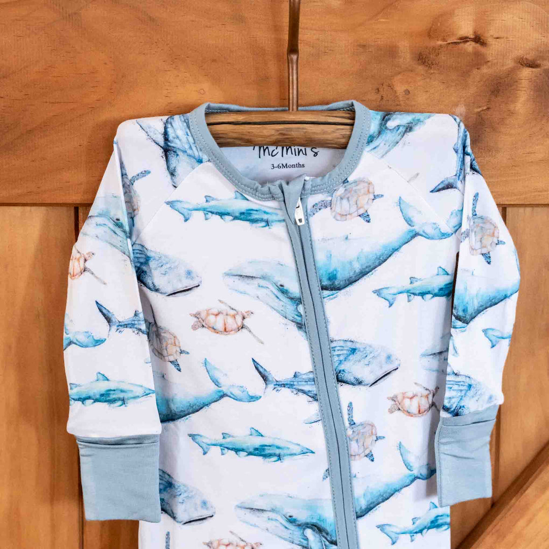 Sea Life Baby Onesie – humpback whale, turtles, sharks - hanging close up